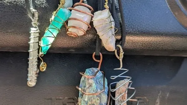 Hand-wrapped decorative stones made at Earthship Journey
